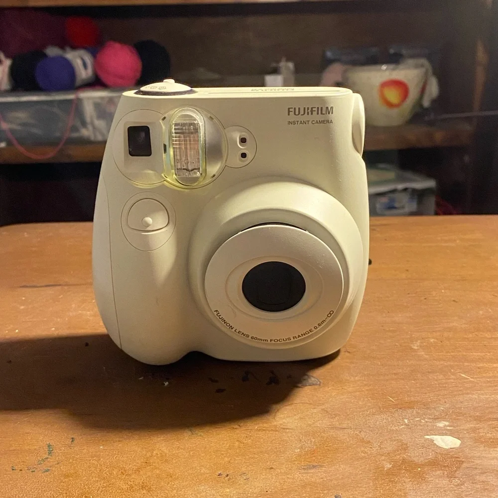 Polaroid camera with film